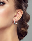 Sterling silver hoop earrings with cat ears and whiskers (worn by model).