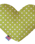 Heart shaped squeaker dog toy. Green background with white polka dots. Made in USA label on bottom trim.