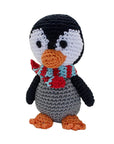 Knit Knacks "Chilly Willy the Penguin" handmade organic cotton dog toy. Black and white penguin with an orange beak and feet, wearing a blue and white striped scarf.