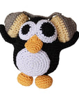 Knit Knacks "Hipster Penguin" handmade organic cotton dog toy. Black and white penguin with a yellow beak and feet, listening to music on big headphones.