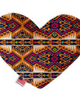Heart shaped squeaker dog toy. Southwestern print. Main color is orange, with pink, turquoise, off-white and green accent colors. Made in USA label on bottom trim.