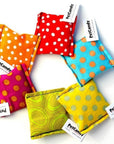 Handmade square shaped toys in various colors and patterns, stuffed with US grown, farm fresh catnip. Made in USA.