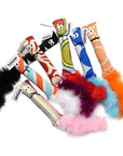 Handmade squirrel kicker toys in various colors and patterns with feather tails. Each one is stuffed with US grown, farm fresh catnip. Made in USA.