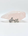 Sterling silver cat earring studs with moon shaped heads and cubic zirconia gemstones. Very small.