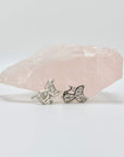 Sterling silver cat earring studs with moon shaped heads and cubic zirconia gemstones. Very small.
