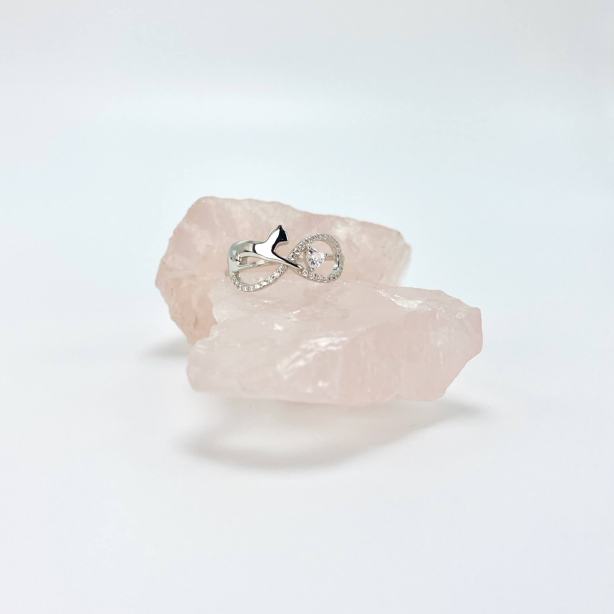 Sterling silver infinity cat ring with cubic zirconia gemstones in a pave setting.
