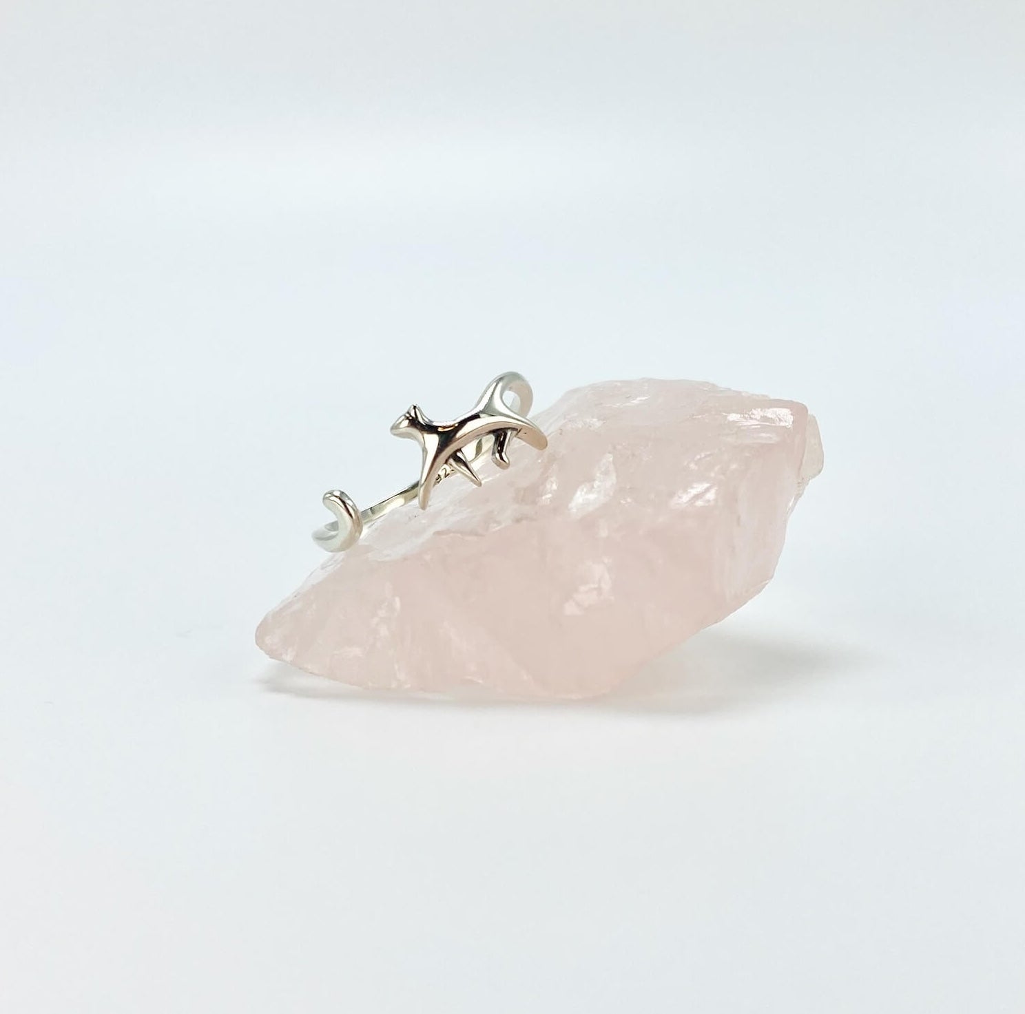 Sterling silver ring in the shape of a cat walking. Open, adjustable band.