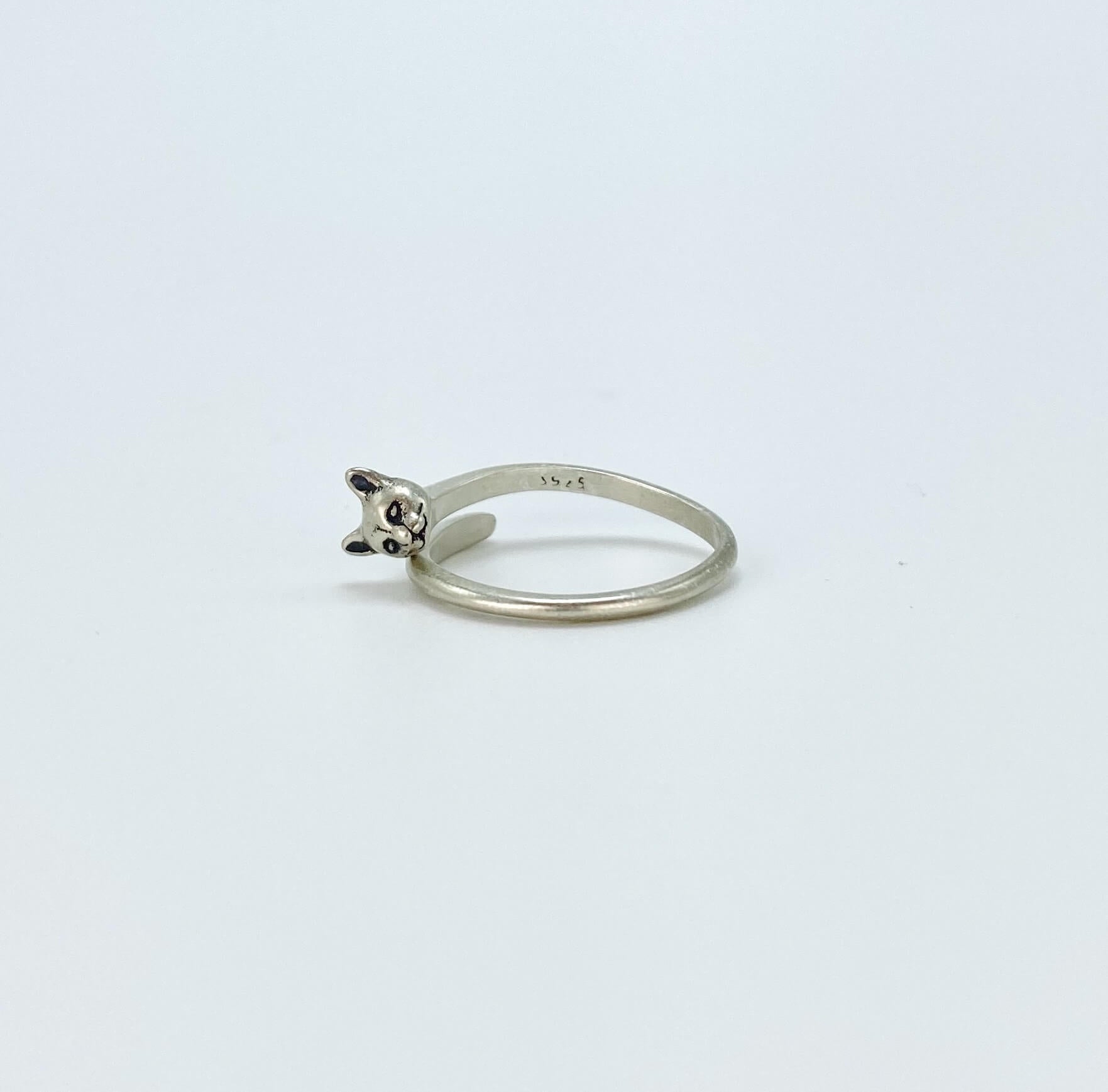 Sterling silver wrap around ring with panther head. Antiqued/vintage style.