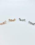 Sterling silver paw print climber earrings in rose gold and silver.