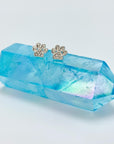 Sterling silver paw earring studs with cubic zirconia gemstones.