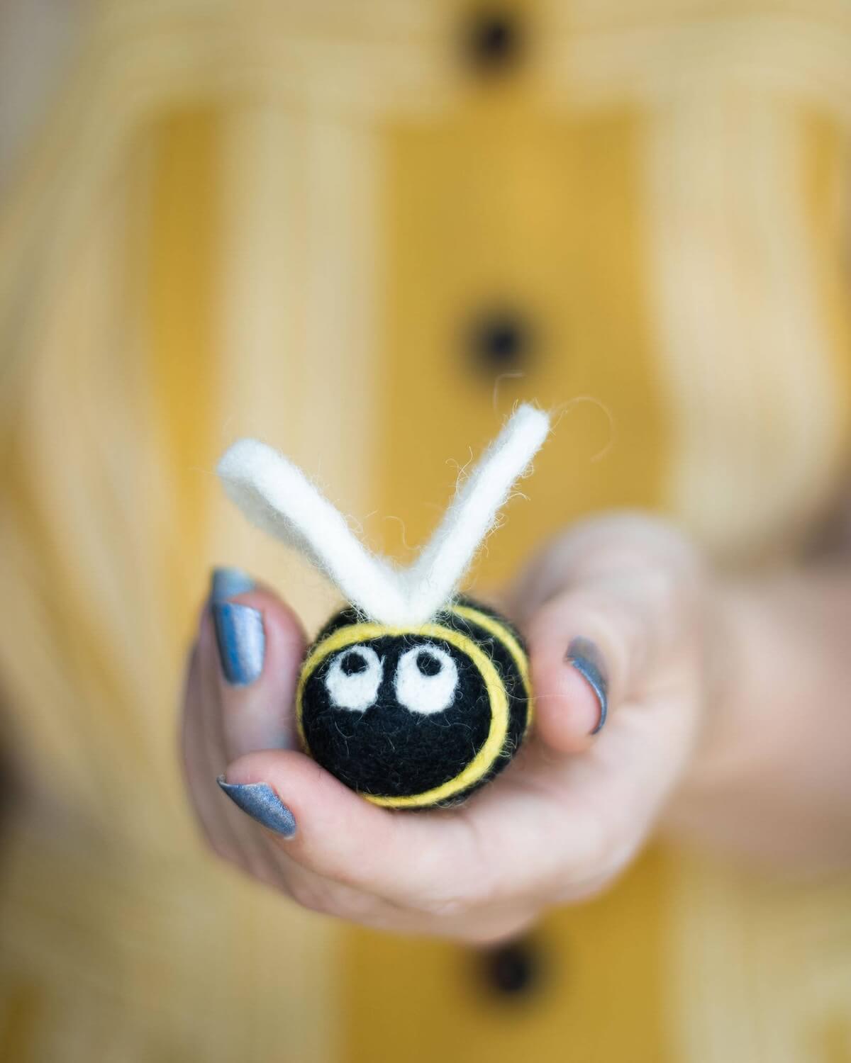Organic wool bee cat toy.