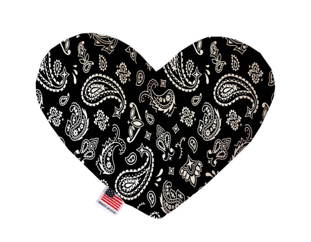 Heart shaped squeaker dog toy. Black western bandana paisley print. Made in USA label on bottom trim.