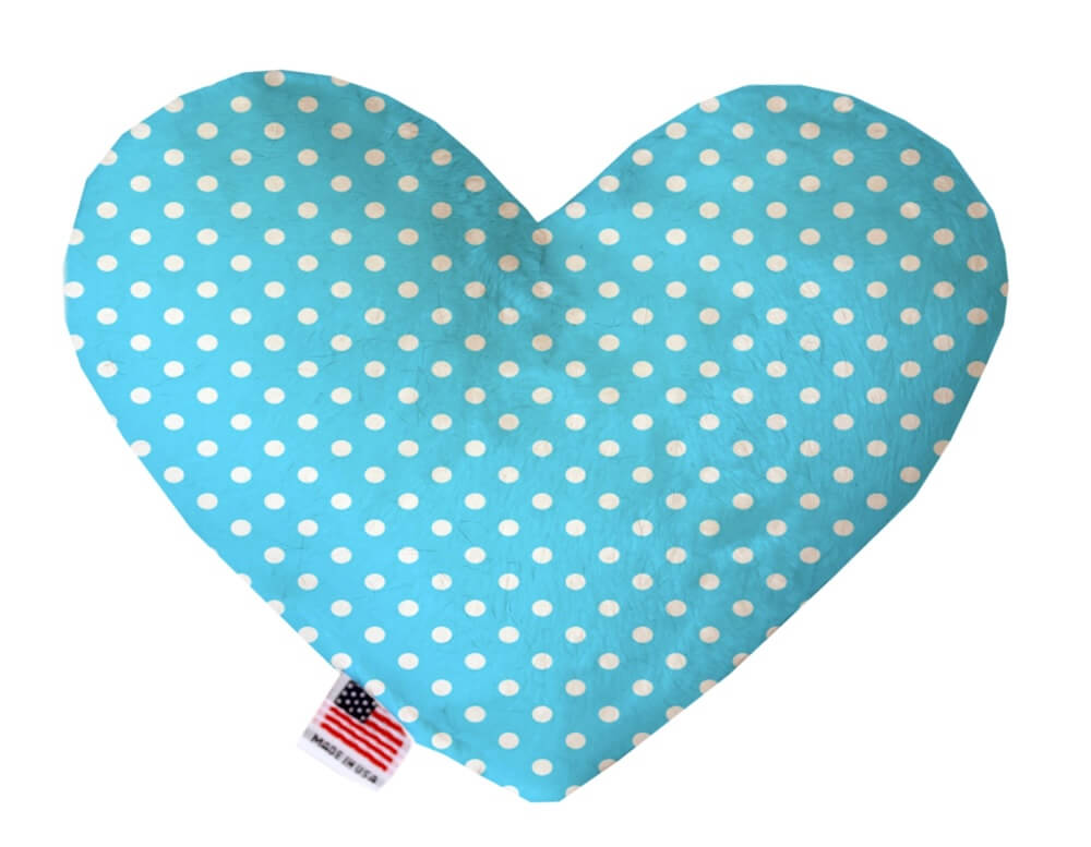 Heart shaped squeaker dog toy. Blue background with white polka dots. Made in USA label on bottom trim.