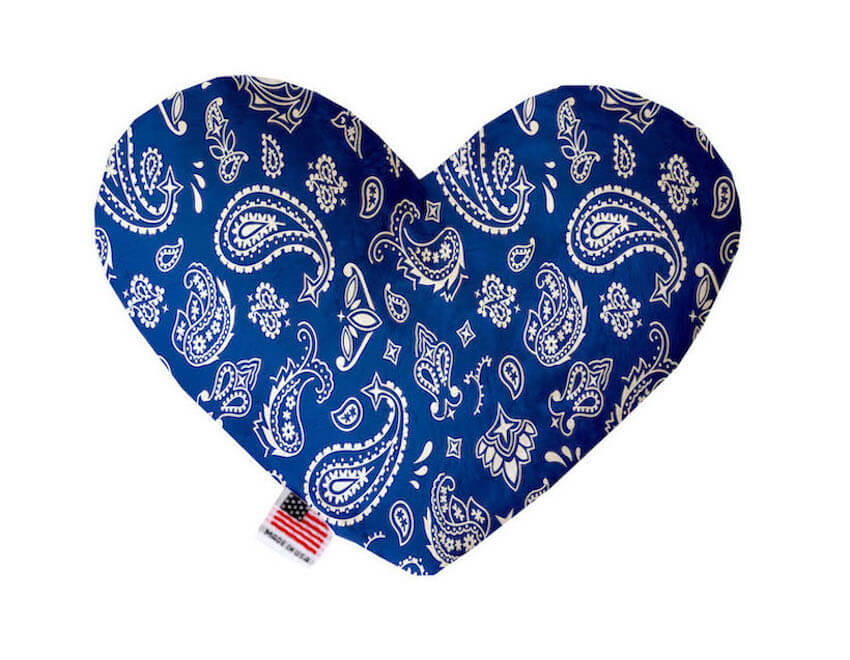 Heart shaped squeaker dog toy. Blue western bandana paisley print. Made in USA label on bottom trim.