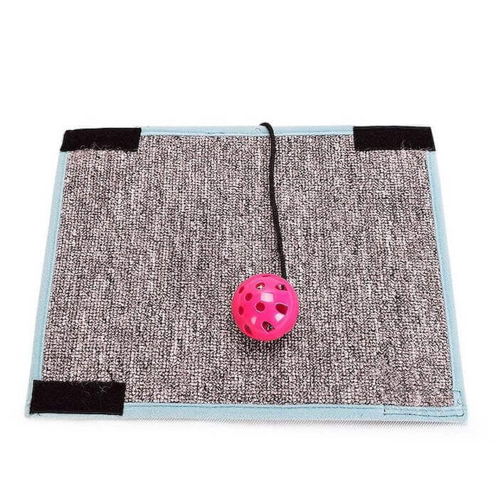 Portable cat scratching mat and furniture protector (gray carpet).
