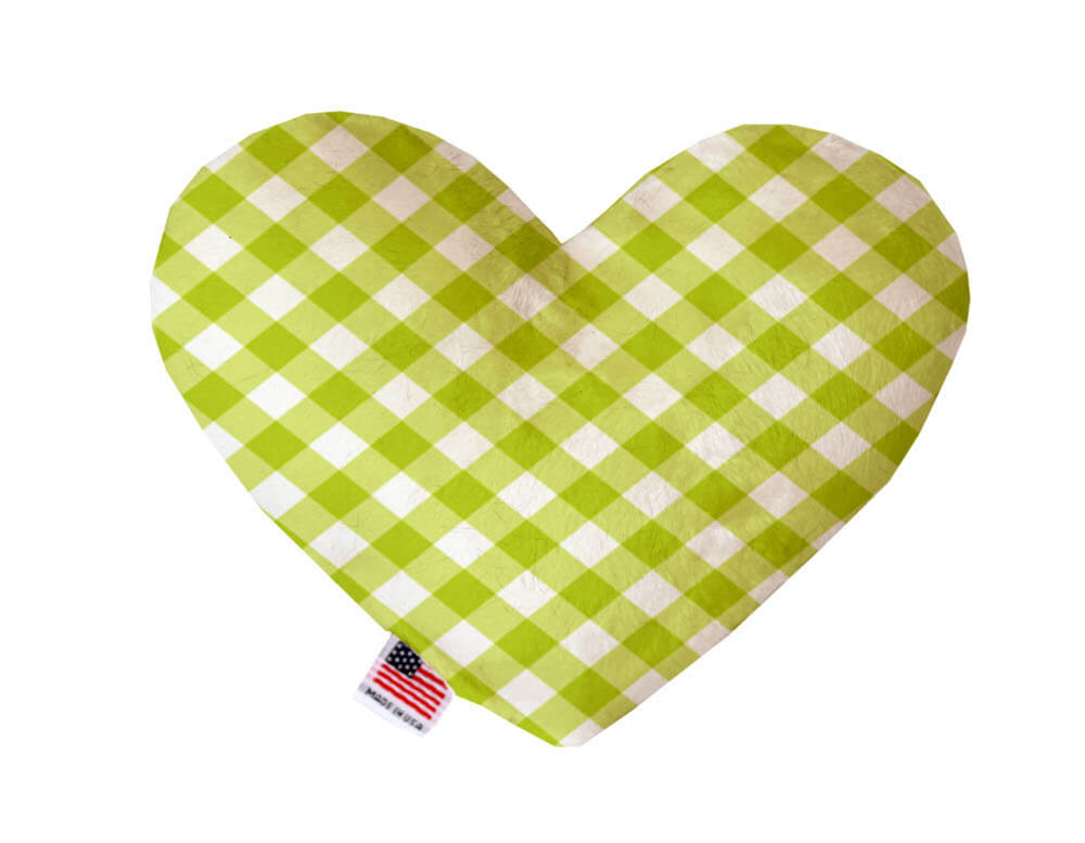Heart shaped squeaker dog toy in a green and white gingham print. Made in USA label on bottom trim.