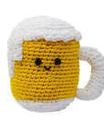 Knit Knacks "Mugsy the Beer Mug" handmade organic cotton dog toy. Anthropomorphic beer mug with a happy face, foam on its head, and a white handle.