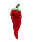 Knit Knacks "Chili P. Pepper" handmade organic cotton dog toy. Red anthropomorphic chili pepper with a happy expression, rosy cheeks, and a green stem on its head.