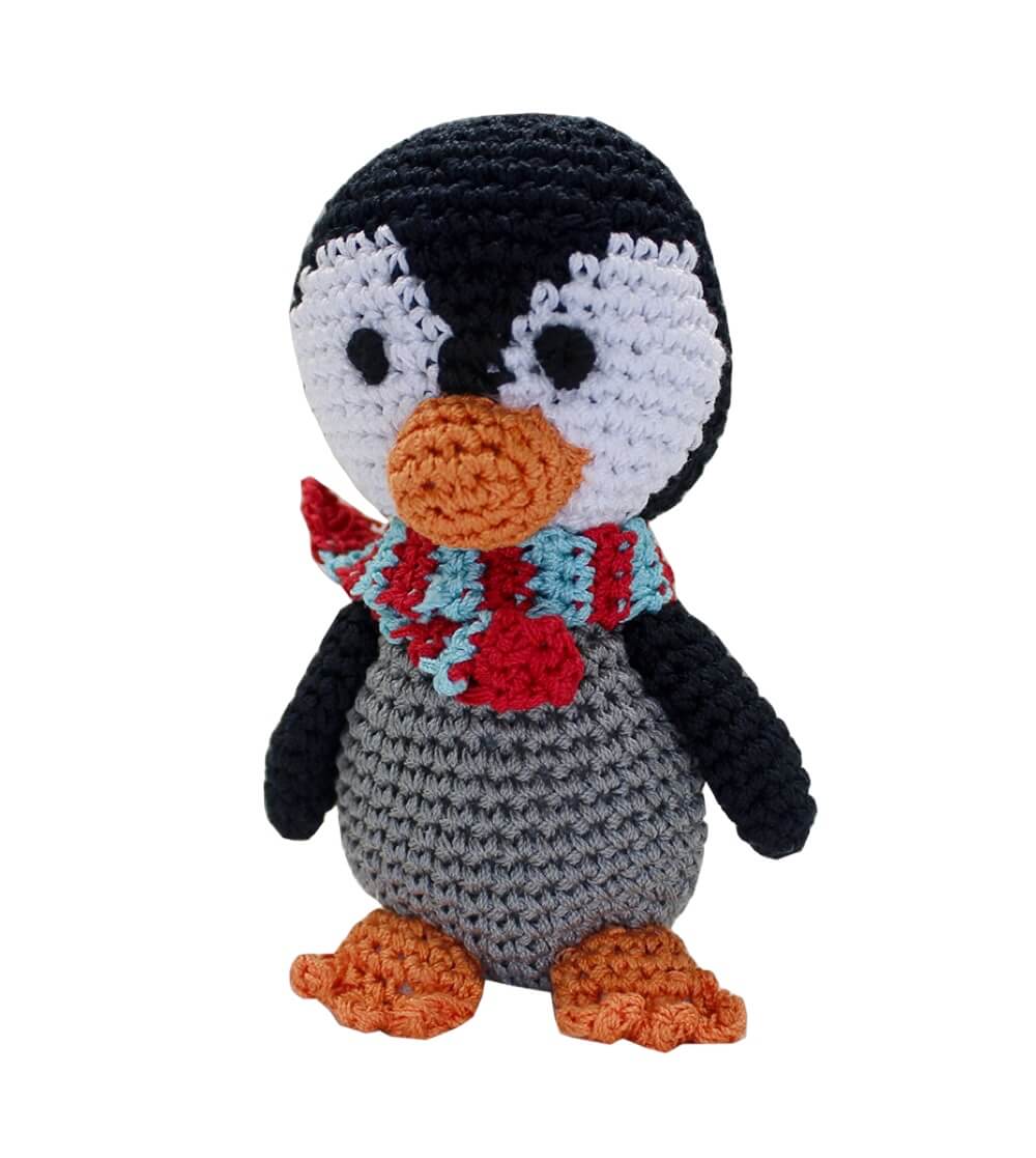 Knit Knacks "Chilly Willy the Penguin" handmade organic cotton dog toy. Black and white penguin with an orange beak and feet, wearing a blue and white striped scarf.