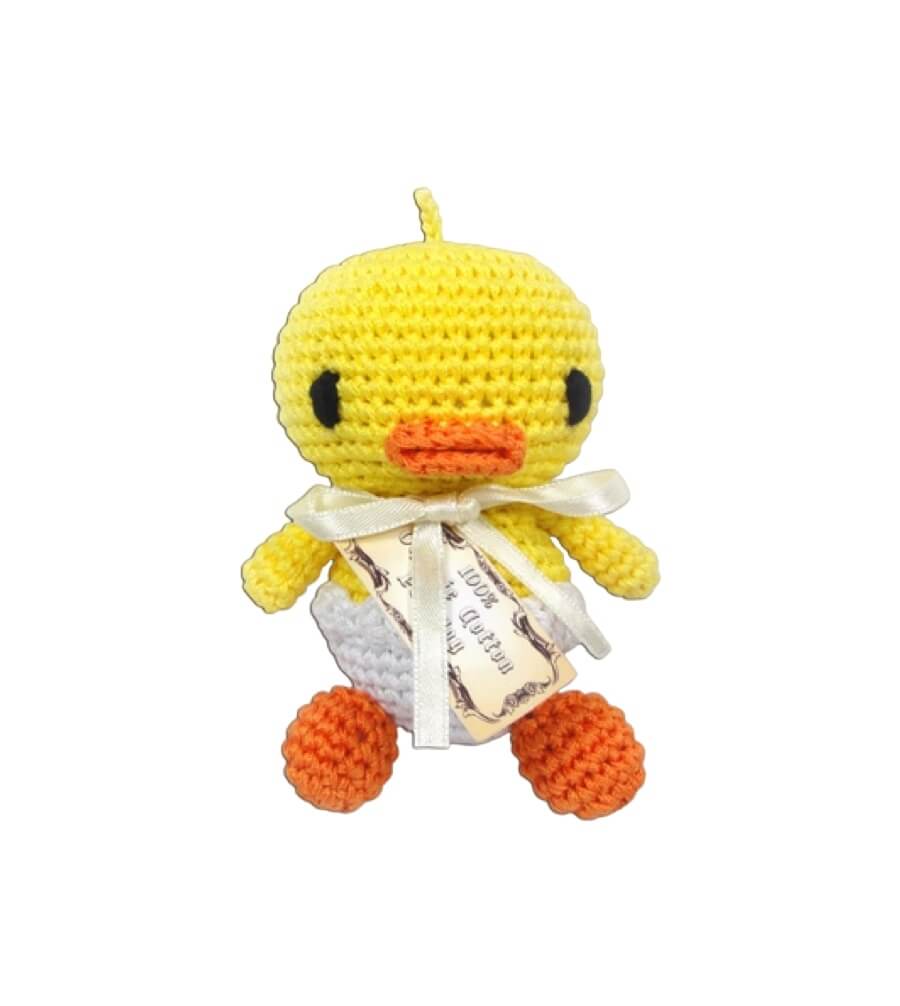 Knit Knacks &quot;Hatch the Baby Duck&quot; handmade organic cotton dog toy. Yellow duck with an orange beak and feet, sitting in a white egg shell.