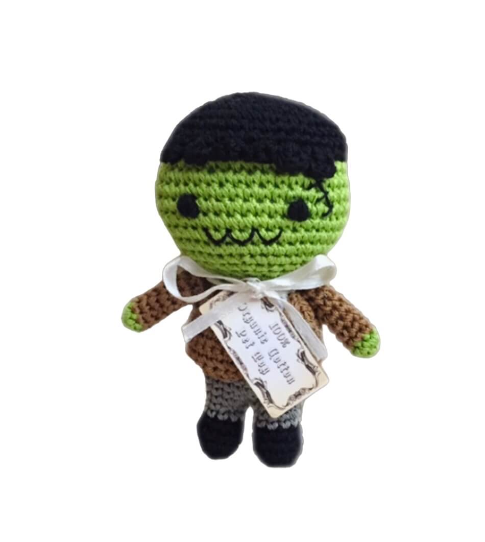 Knit Knacks "Franky the Monster" handmade organic cotton dog toy. Green Frankenstein monster with black hair, a brown jacket and gray pants.