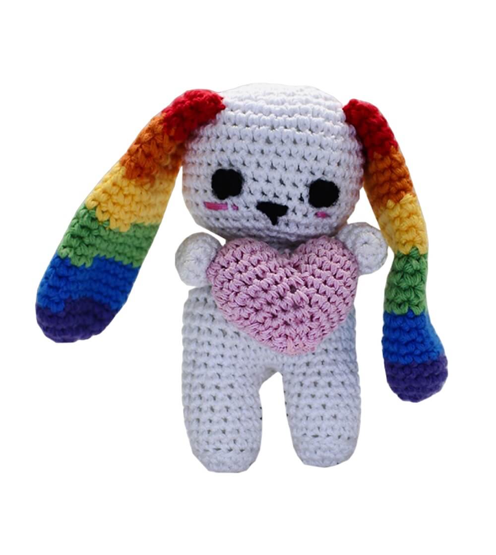 Knit Knacks &quot;Lulu the Love Bunny&quot; handmade organic cotton dog toy. White bunny with floppy rainbow ears, holding a heart.