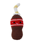 Knit Knacks "Soda Pop Bottle" handmade organic cotton dog toy. Anthropomorphic cola bottle with a smiling face. Has a horizontal red stripe and a white straw coming out of its head.