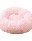 Pale pink donut plush cat/dog bed.