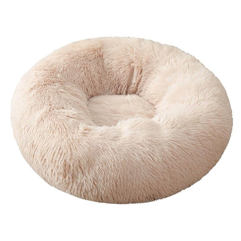 Beige donut plush cat/dog bed.