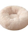 Beige donut plush cat/dog bed.