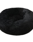 Black donut plush cat/dog bed.