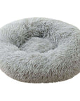 Gray donut plush cat/dog bed.