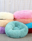 Multicolored donut plush cat/dog beds.