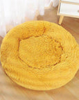 Mustard yellow donut plush cat/dog bed.