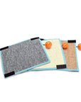 Three varieties of portable cat scratching mats (gray carpet, blond sisal and tan sisal).