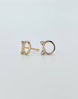 Sterling silver minimalist cat head "o" stud earrings with cubic zirconia gems in rose gold.