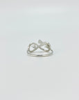 Sterling silver infinity cat ring with cubic zirconia gemstones in a pave setting.