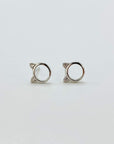 Sterling silver minimalist cat head "o" stud earrings with cubic zirconia gems in rose gold and silver.