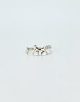 Sterling silver ring in the shape of a cat walking. Open, adjustable band.