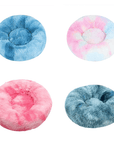 Variety of tie-dye plush donut beds in different colors.