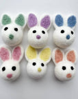 A grouping of six easter bunny felted wool cat toys.